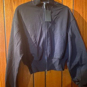 LIT..fitted black zip up jacket.. Sz. Large..